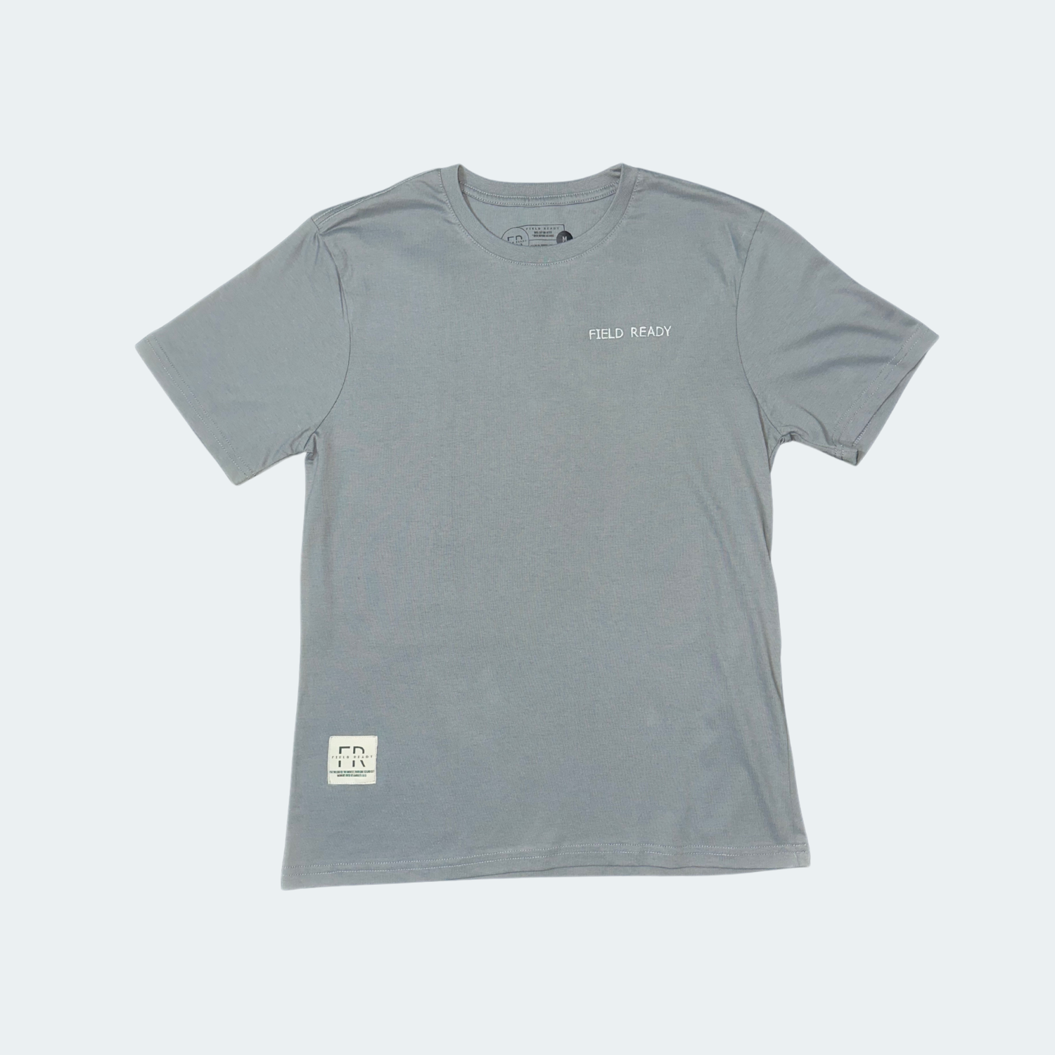 Gray t-shirt with text on a light gray background